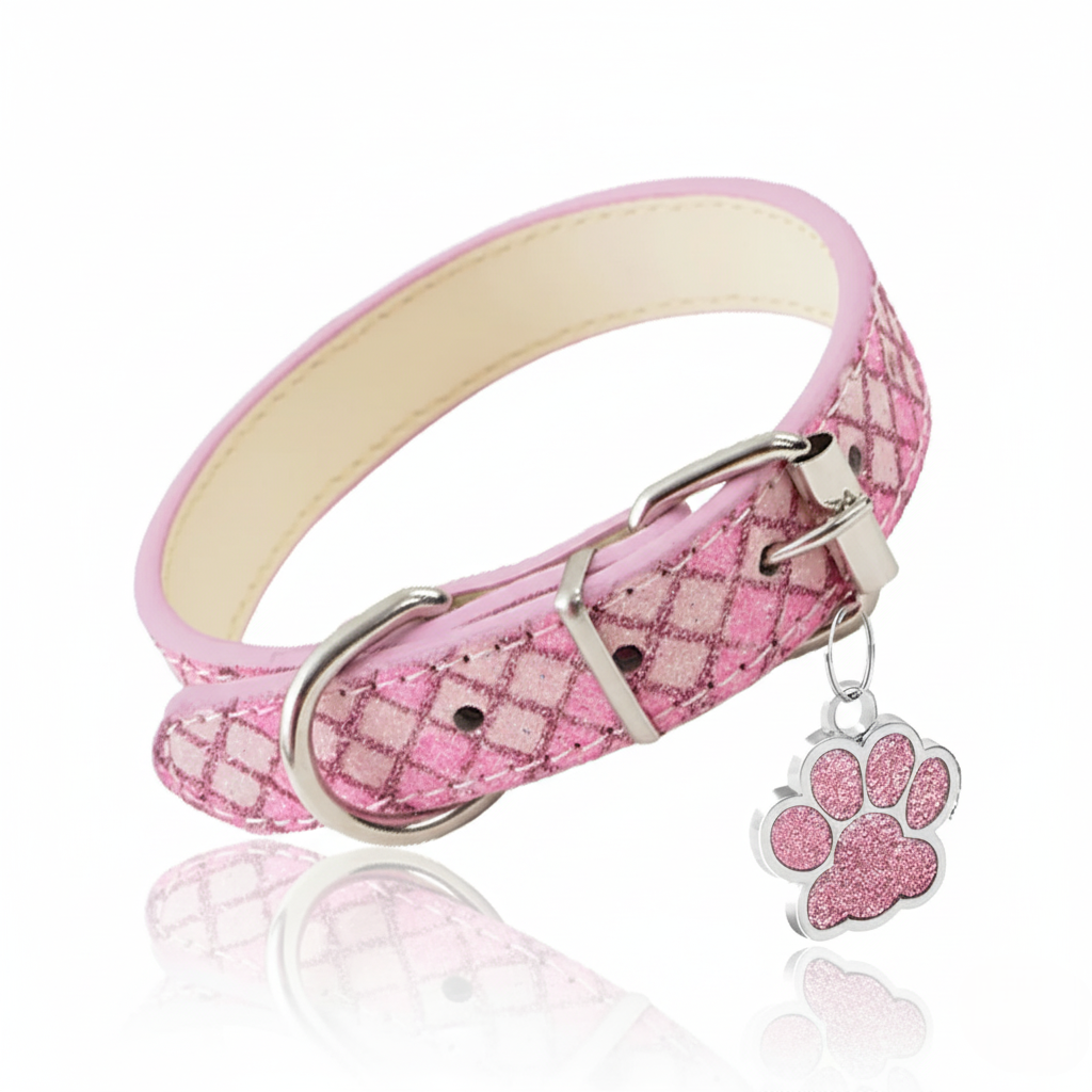 Pink dog collar with paw charm on a white background