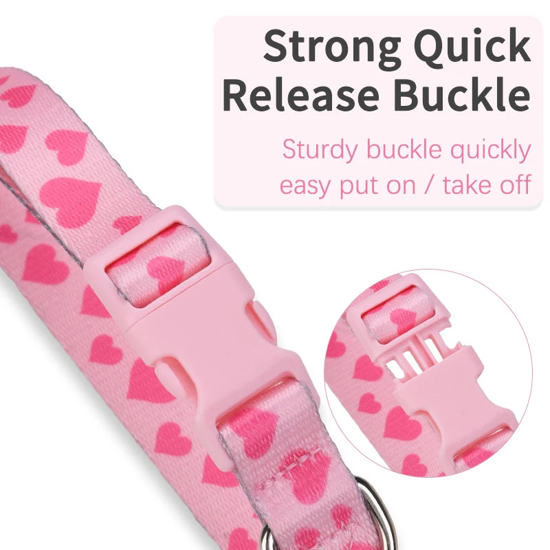 Pink pet collar with heart pattern and strong, quick-release buckle on a white background