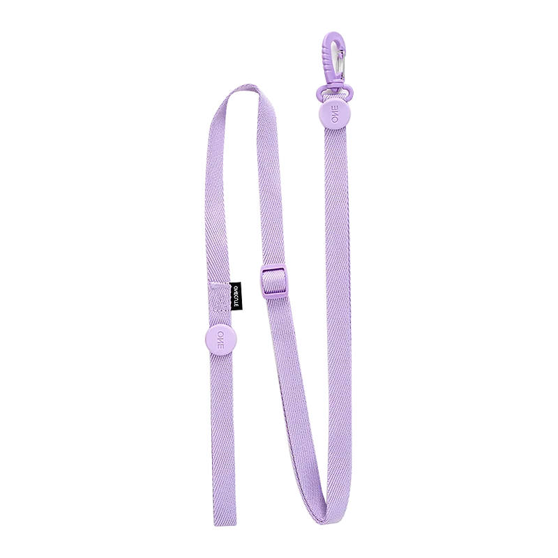 Purple dog leash with a clip on a white background