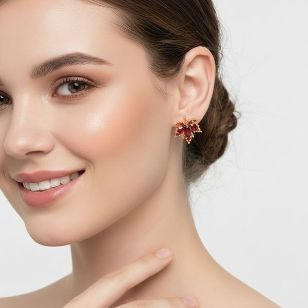 A woman wearing a pair of - Red Ember Leafs – Crystal Stud Elegance
with a neutral background