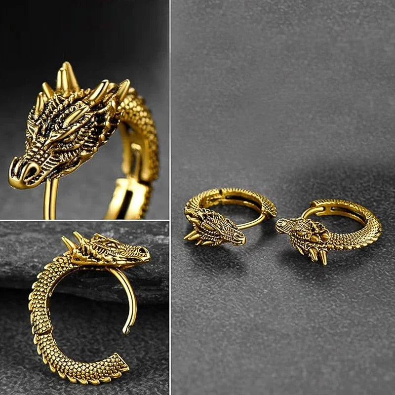 Gold dragon-shaped earrings on a dark background