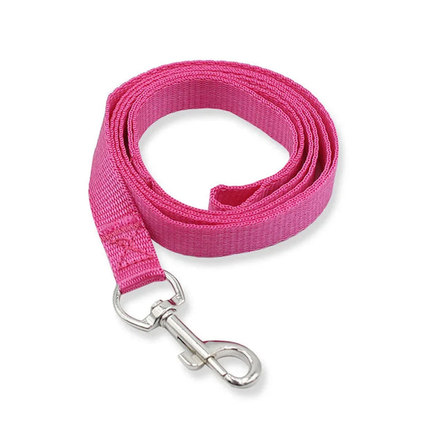 Pink dog leash with a metal clip on a white background