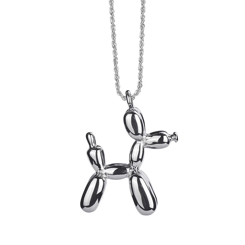 Silver balloon dog pendant on a chain against a white background