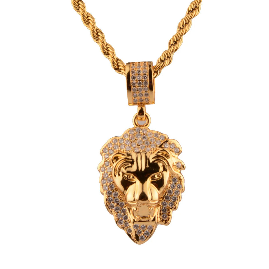 Gold lion head pendant necklace on a white background