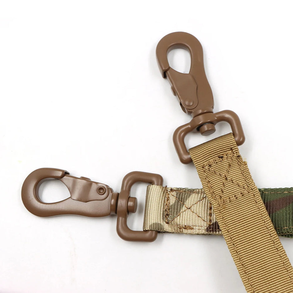 Camouflage dog leash with brown plastic clips on a white background