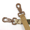 Camouflage dog leash with brown plastic clips on a white background