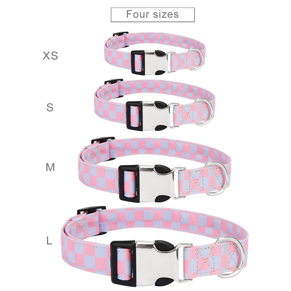 Set of four dog collars in different sizes with a pink and blue checkered pattern.