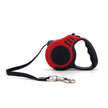 Red and black retractable dog leash on a white background