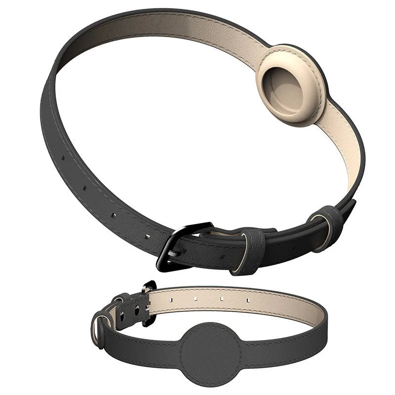 Black and beige dog collar with a central circular component on a white background