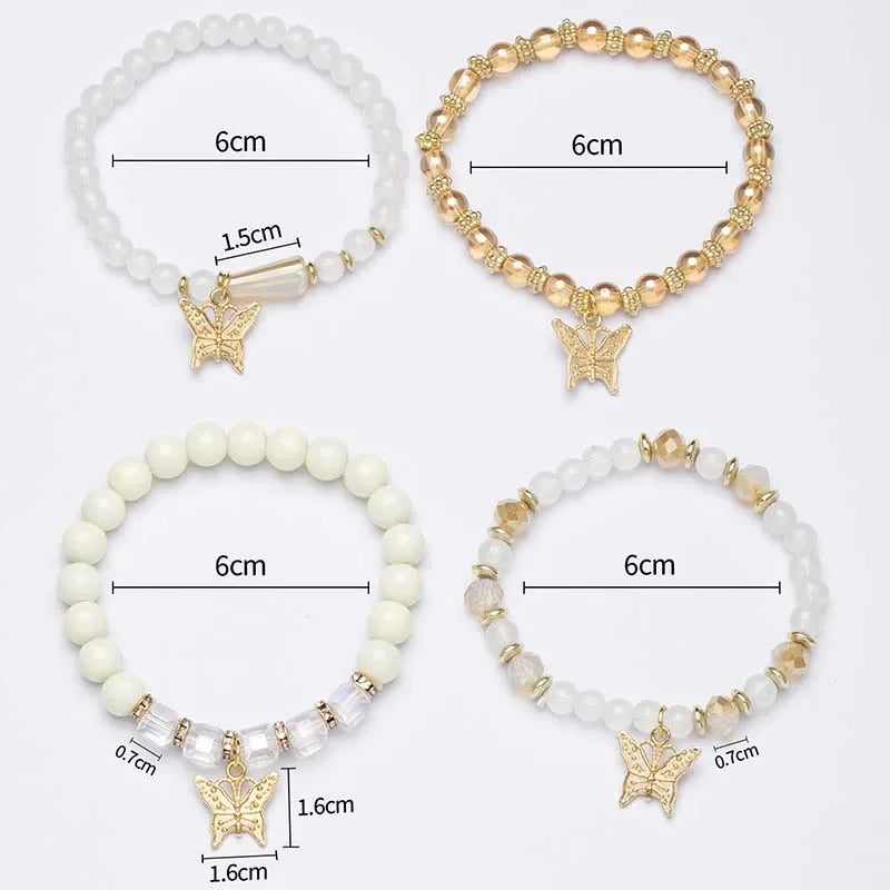 Four beaded bracelets with butterfly charms and measurements on a white background