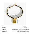 Necklace with gold and black pattern on a white background, featuring product information text.