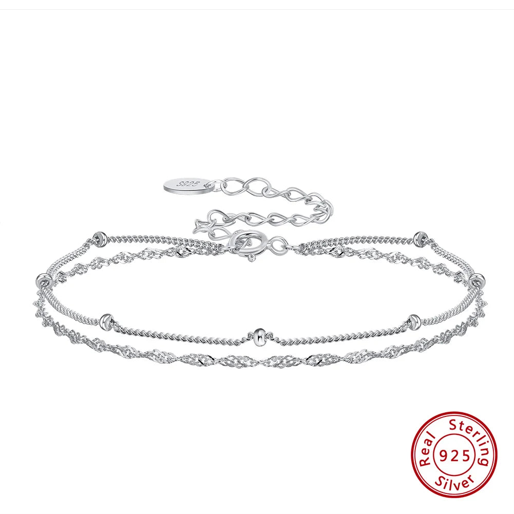 Silver bracelet with a clasp on a white background, featuring '925' stamp.