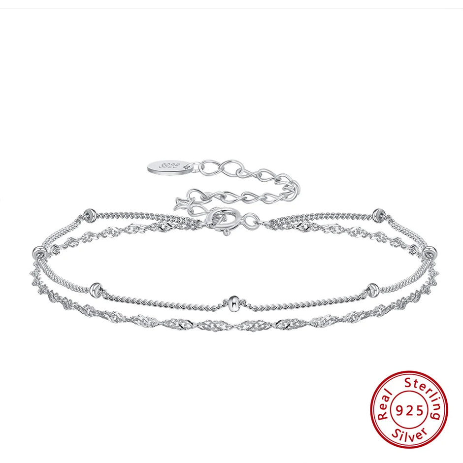 Silver bracelet with a clasp on a white background, featuring '925' stamp.