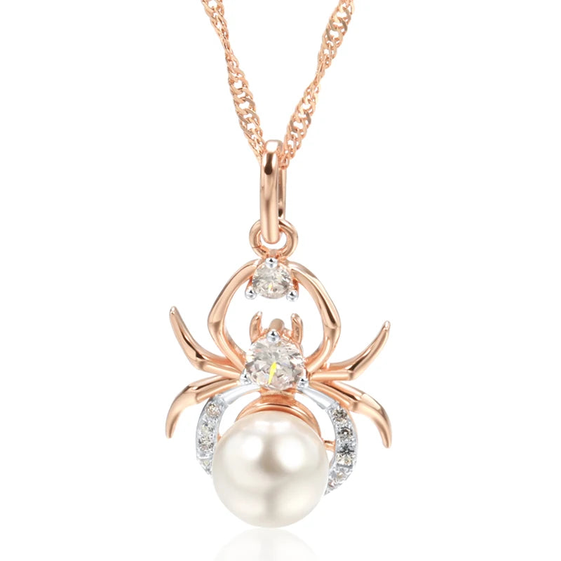 Spider-shaped pendant with pearl and gemstones on a white background