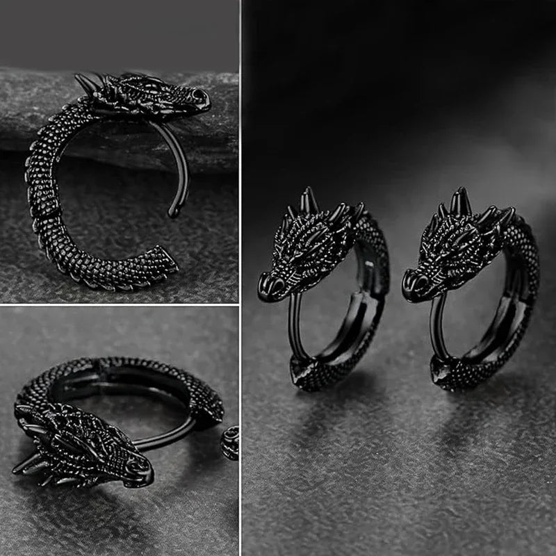 Black dragon-shaped earrings on a dark background