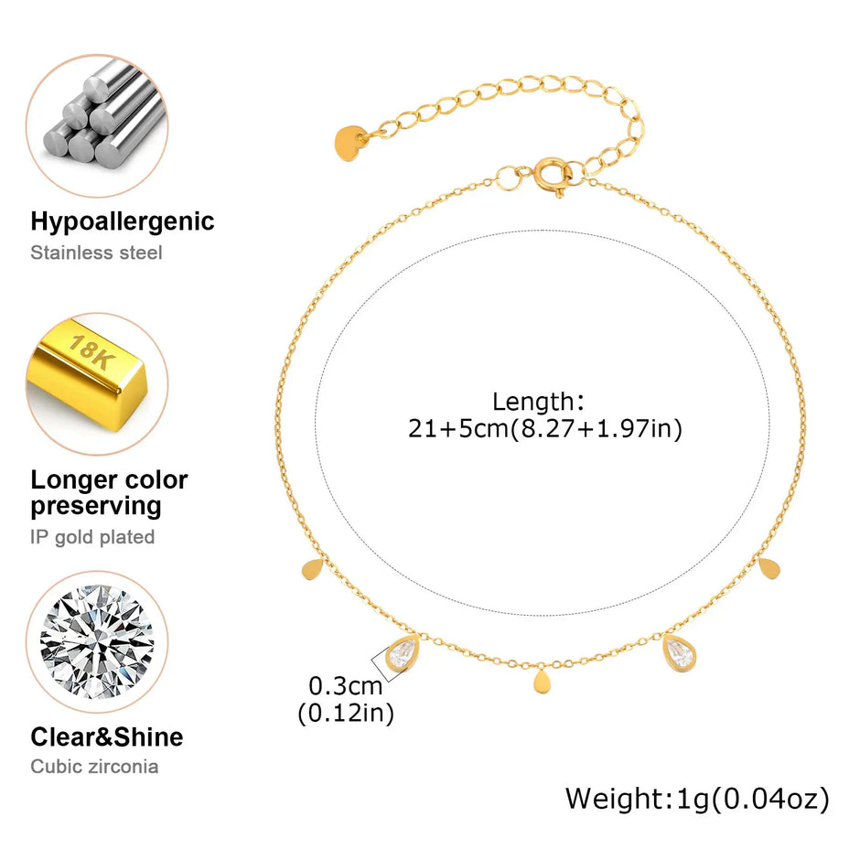 Gold anklet with clear zirconia stones on a white background, featuring product details.