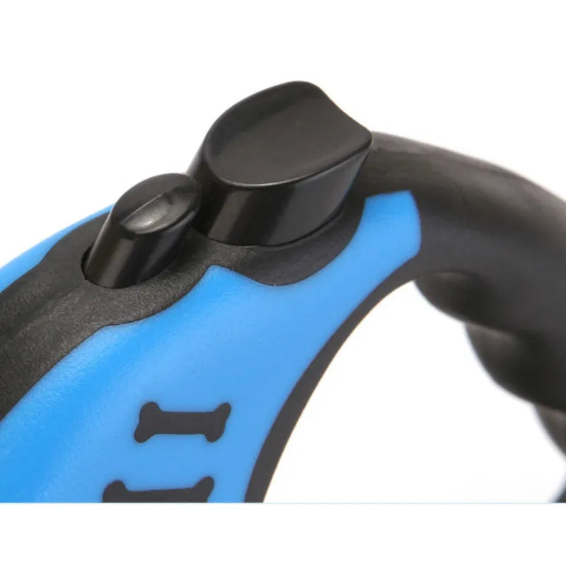 Close-up of a blue and black dog handle with a bone design on a white background