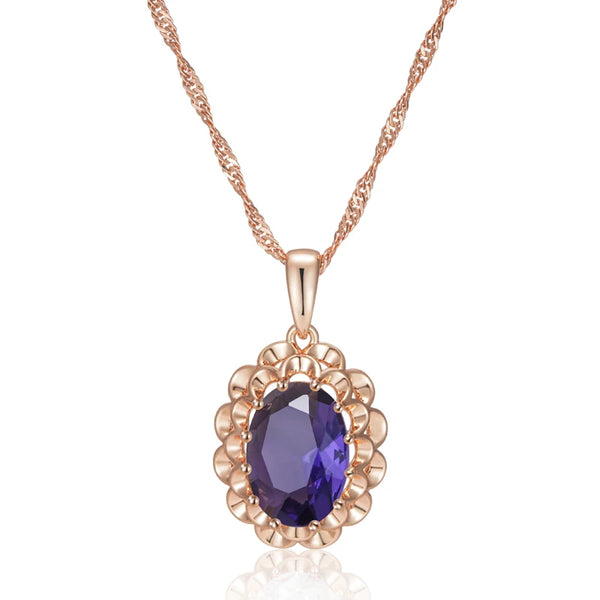 Rose gold necklace with a purple gemstone pendant on a white background