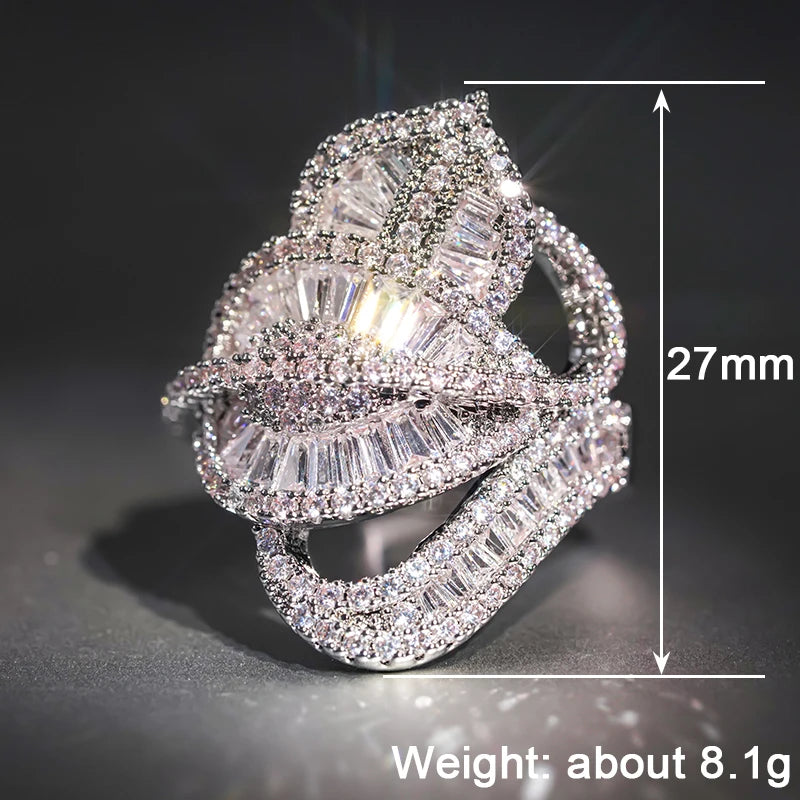 Elegant diamond ring with measurements and weight on a dark background