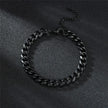 Black chain bracelet on a dark textured surface