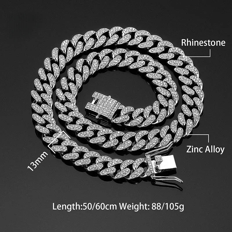 Silver chain necklace with rhinestones on a black background