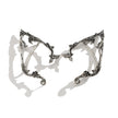 Pair of silver elf ears with intricate designs on a white background