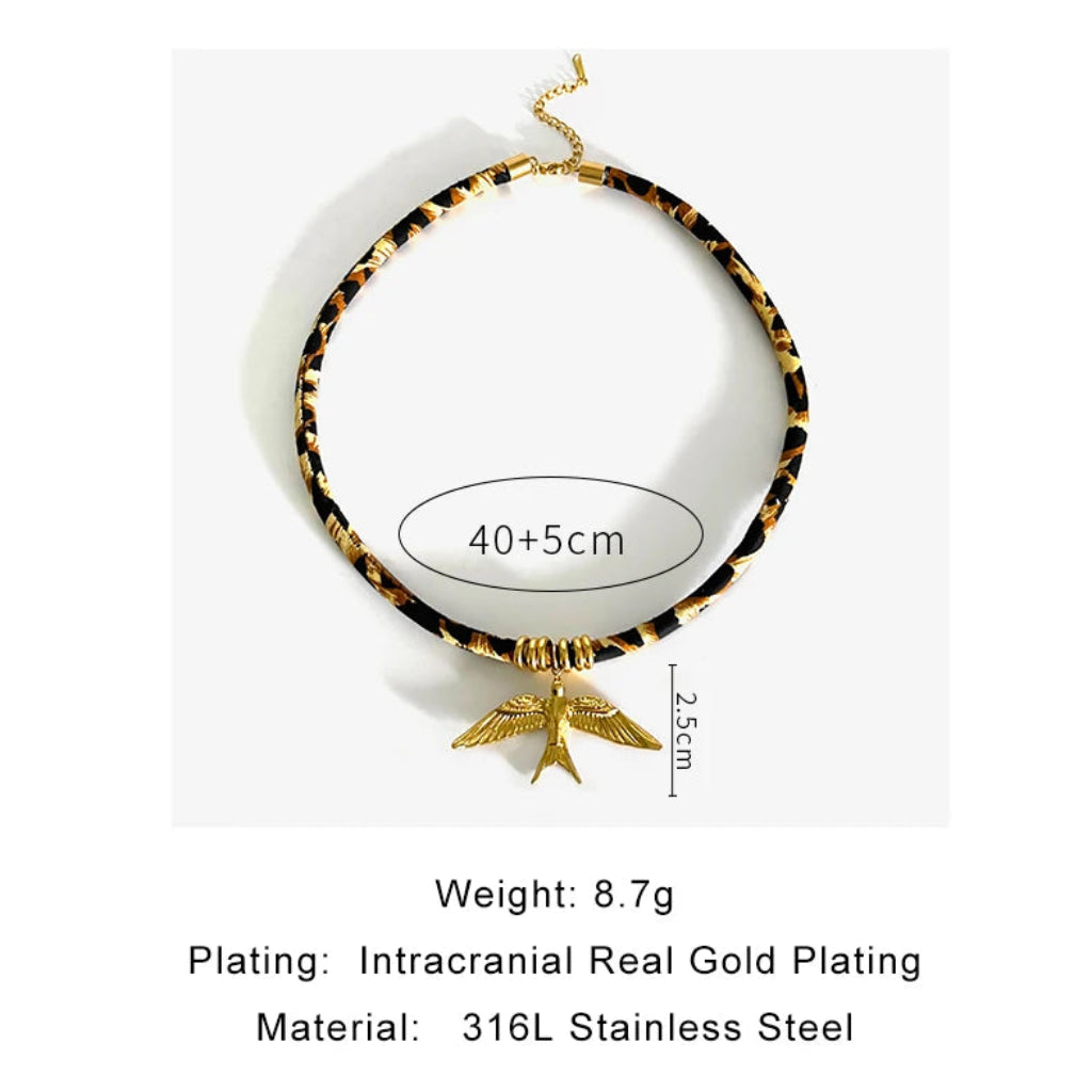 necklace  with gold plating and material details on a white background