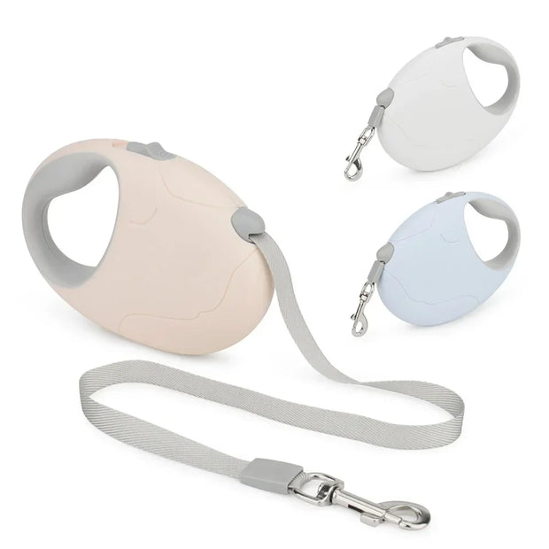 Dog retractable leash with handle and keychain on a white background