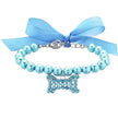Blue beaded collar with a butterfly charm and blue ribbon on a white background