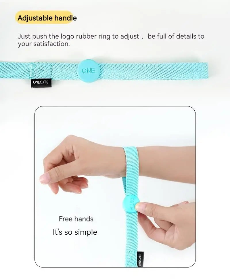 Turquoise Leash with adjustable handle feature, showing hands using it.