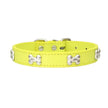 Neon yellow dog collar with silver bone-shaped studs on a white background