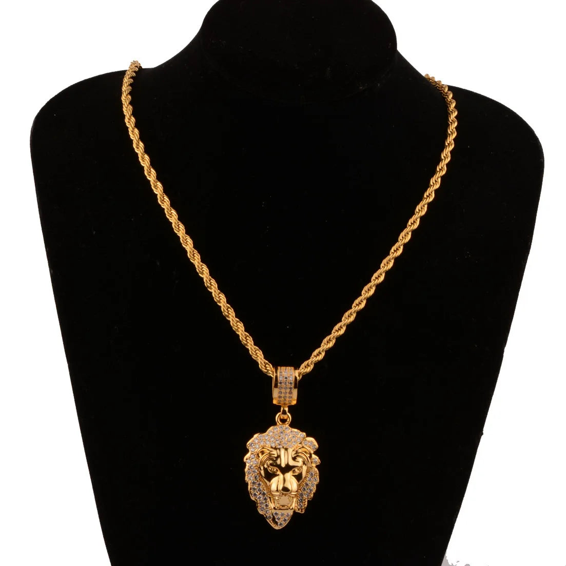 Gold necklace with a lion pendant on a black mannequin bust.