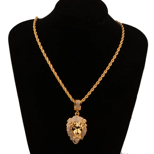 Gold necklace with a lion pendant on a black mannequin bust.