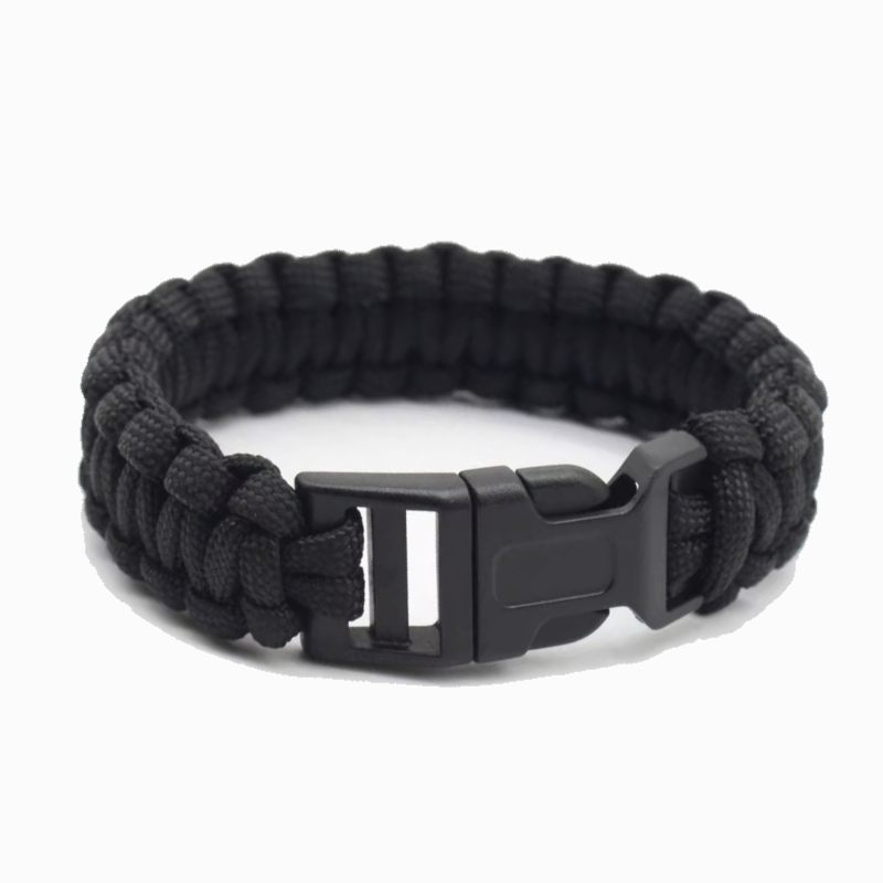 Black paracord bracelet with a black buckle on a white background