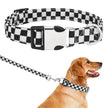 Checkered dog collar and leash set with a dog wearing it on a white background