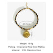 Necklace with gold plating and sun pendant on a white background