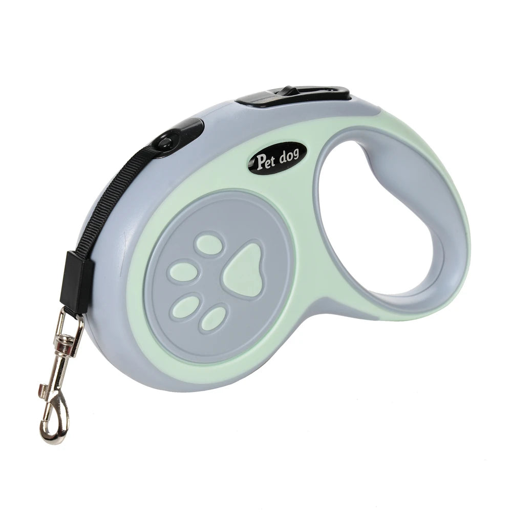 Retractable dog leash with a paw design on a white background
