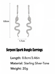Serpent Spark Dangle Earrings with measurements and material details on a white background