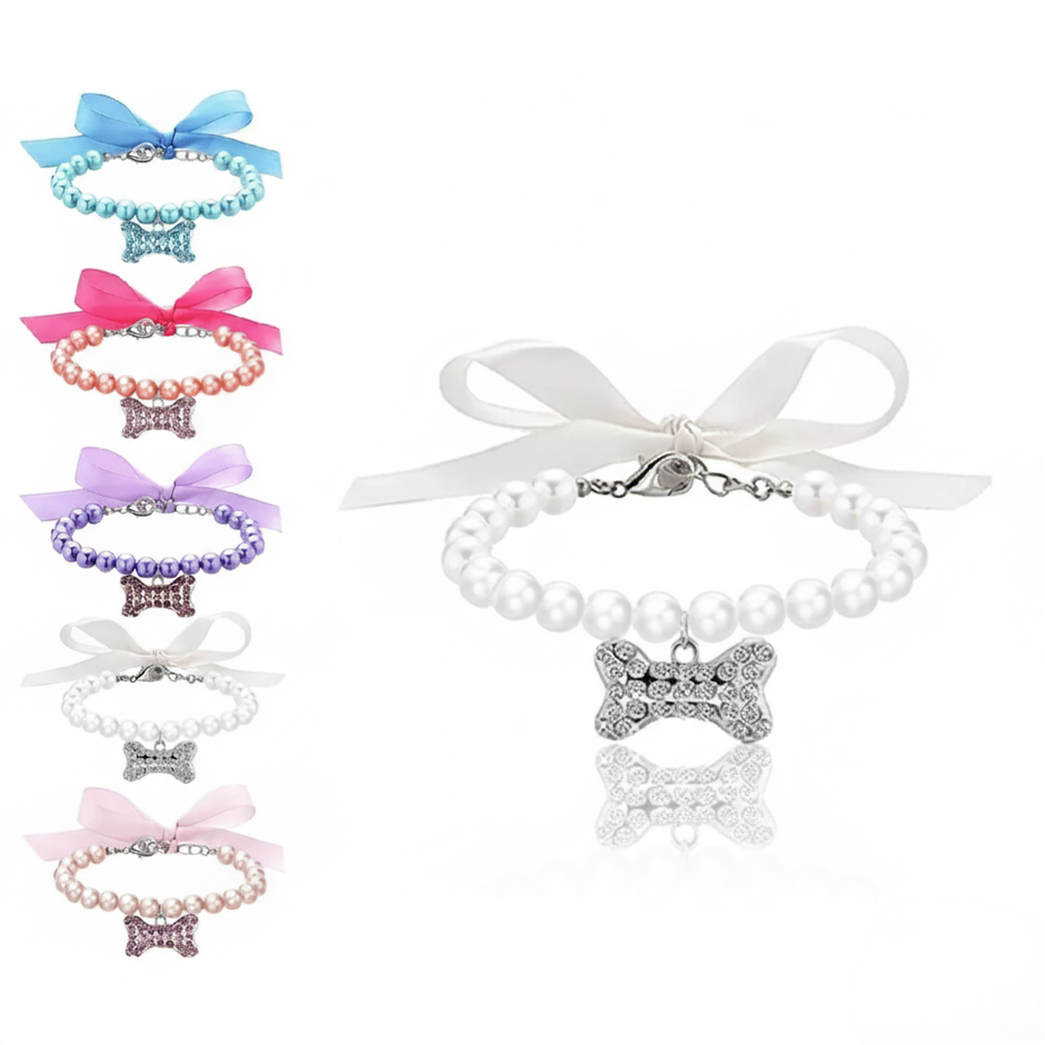 Set of colorful collars with bow and pearl designs on a white background