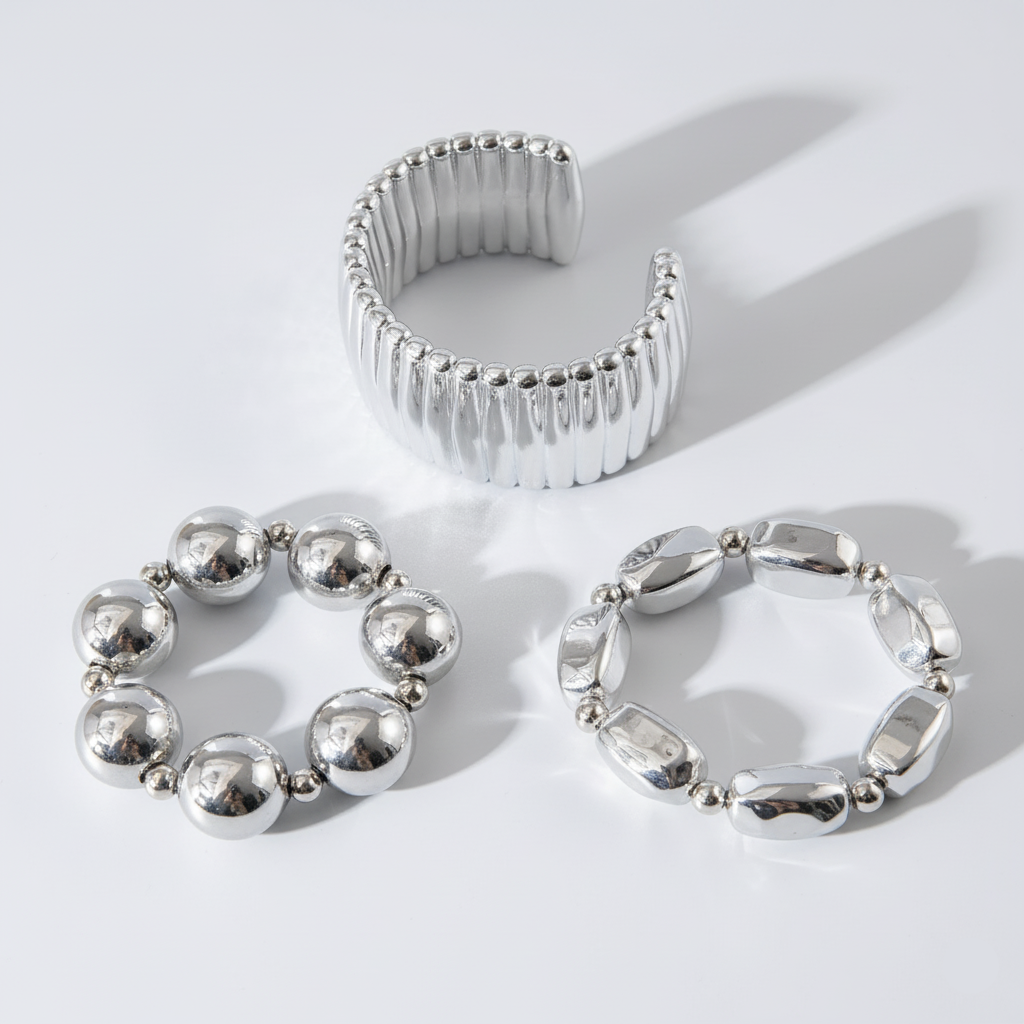 Three silver rings on a white background