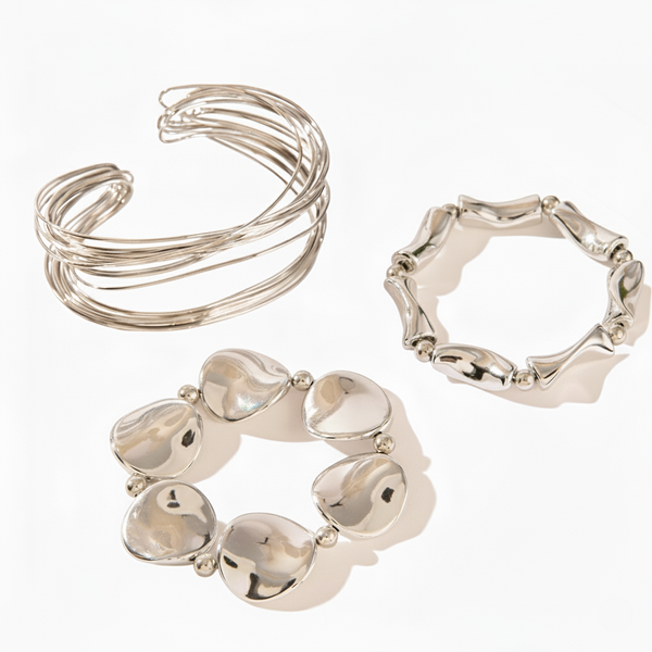 Set of silver rings on a white background