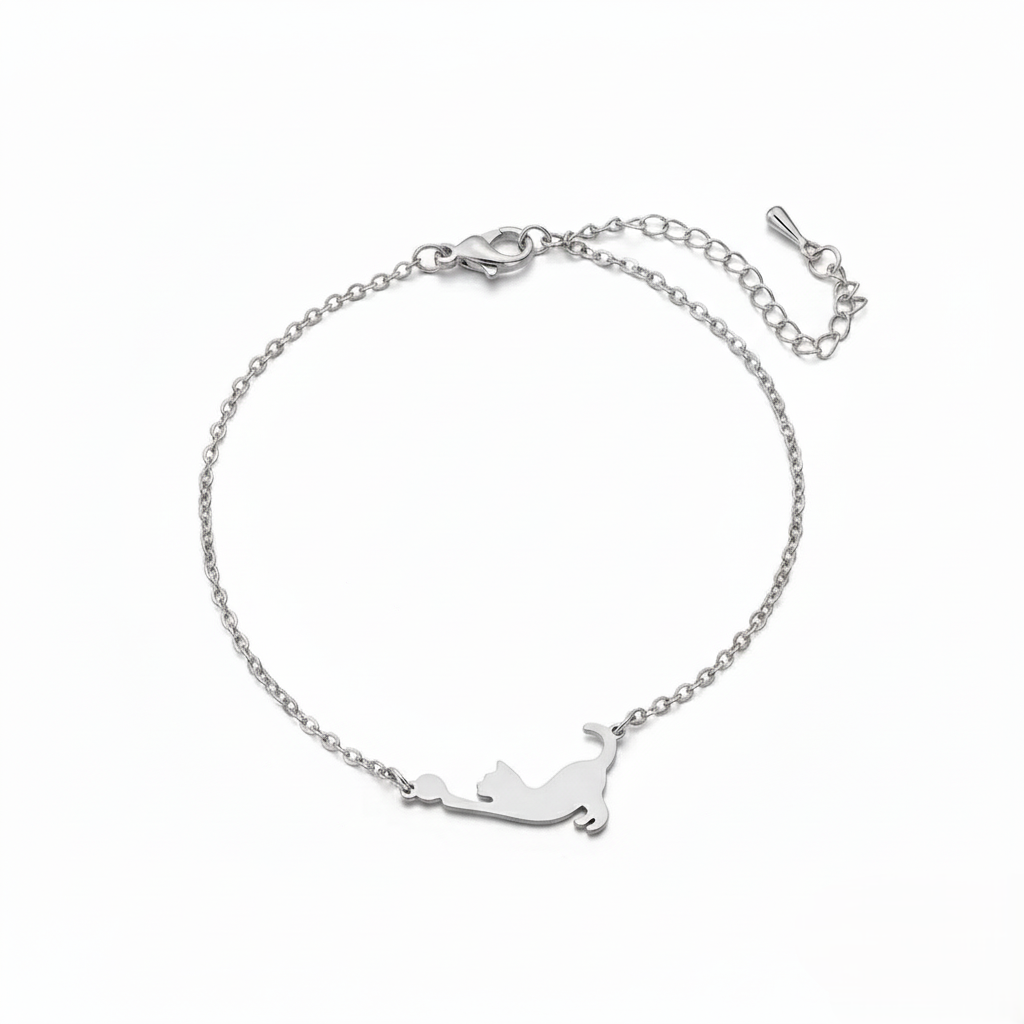 Silver bracelet with a cat-shaped pendant on a white background