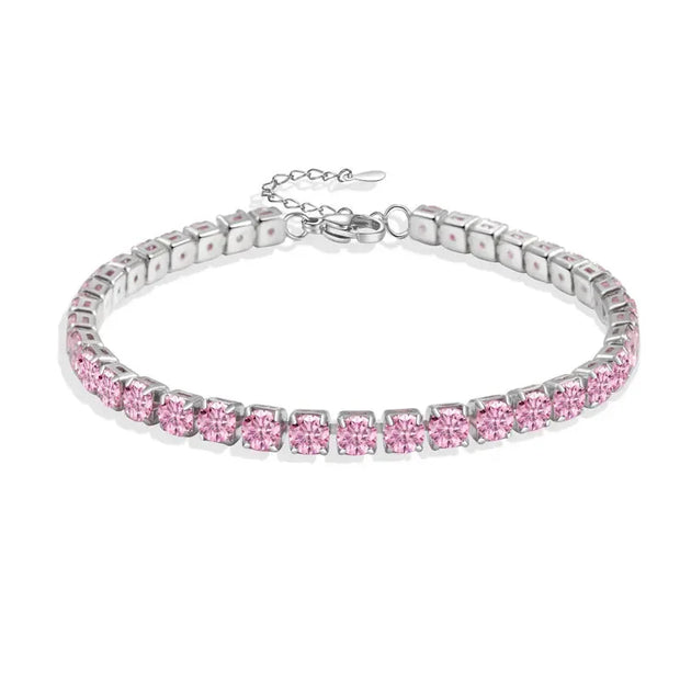 Silver bracelet with pink gemstones on a white background