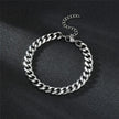 Silver chain bracelet on a black background