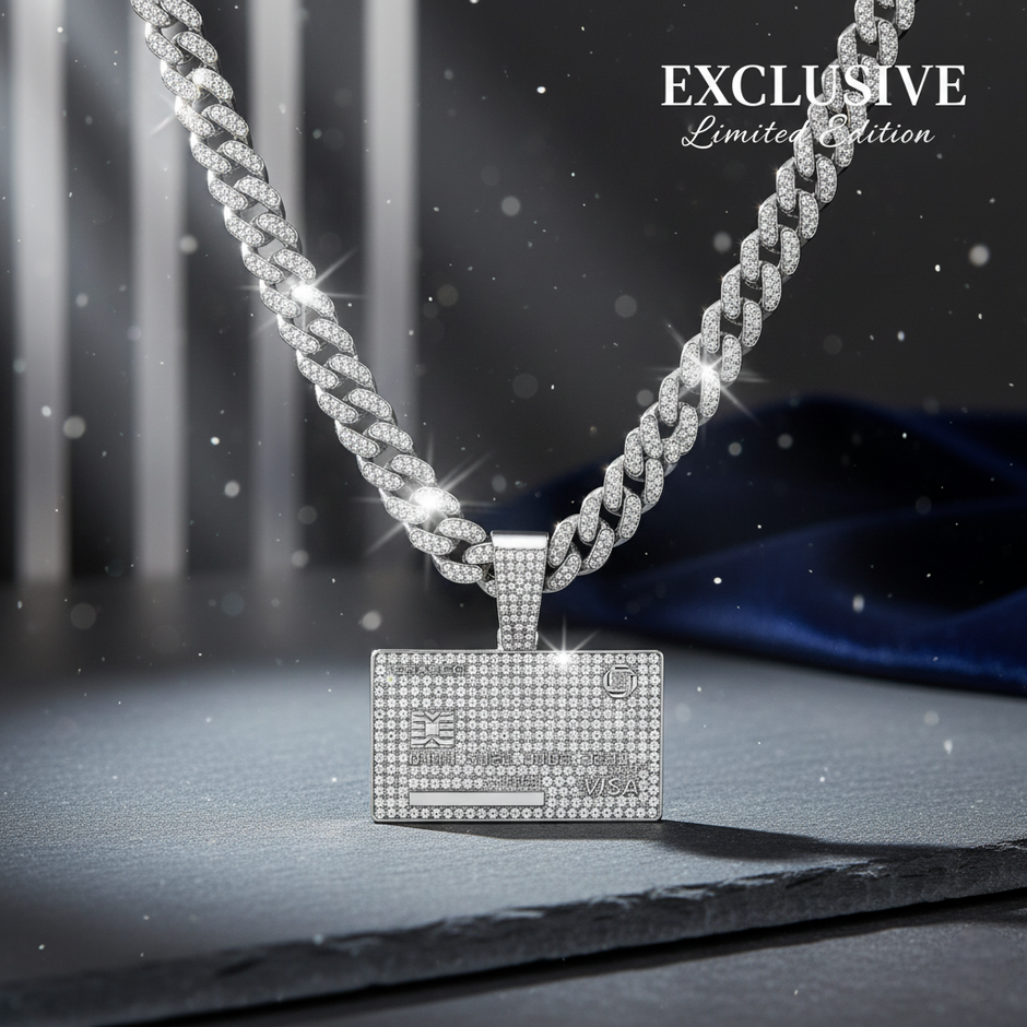 Silver chain necklace with a pendant on a dark background