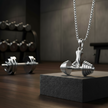 The Barbell Gripper Pendant | Dumbbell Hand Necklace
