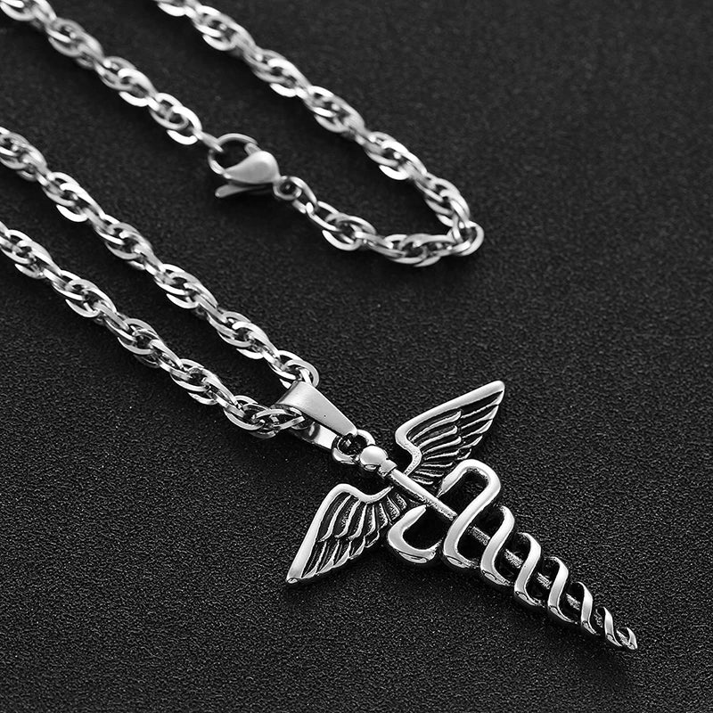 Silver necklace with a caduceus pendant on a dark background