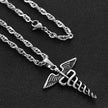Silver necklace with a caduceus pendant on a dark background