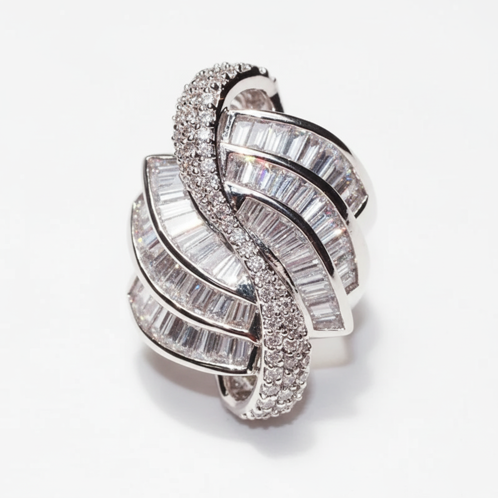 Silver ring with diamond accents on a white background