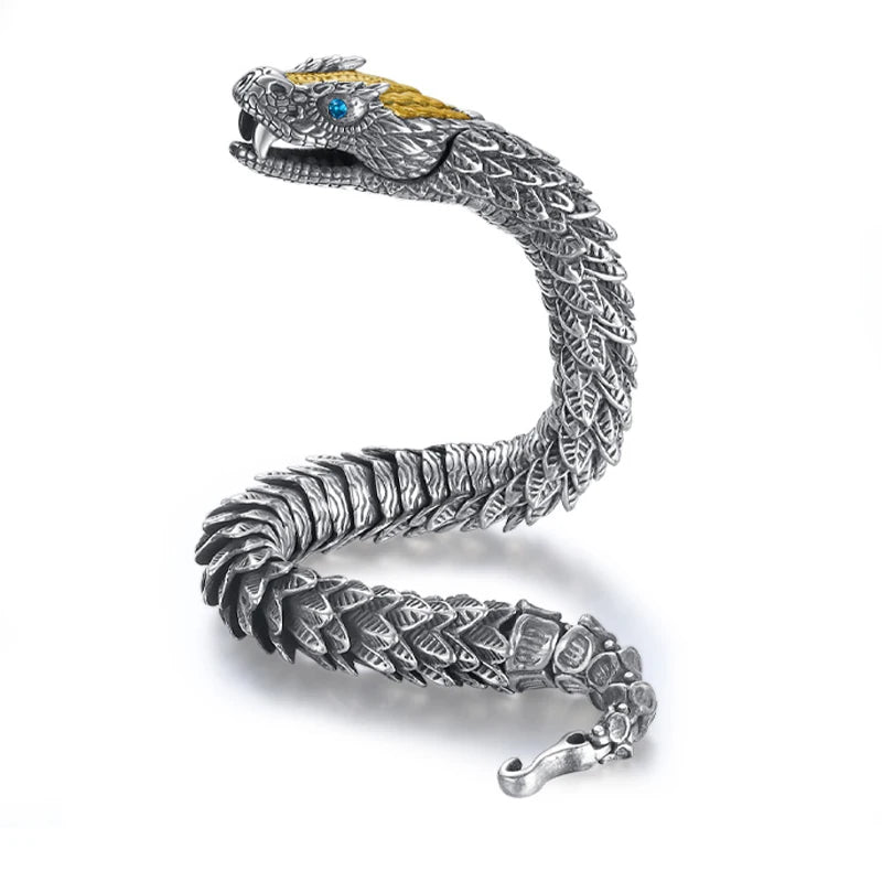 Silver snake-shaped bracelet with detailed design on a white background